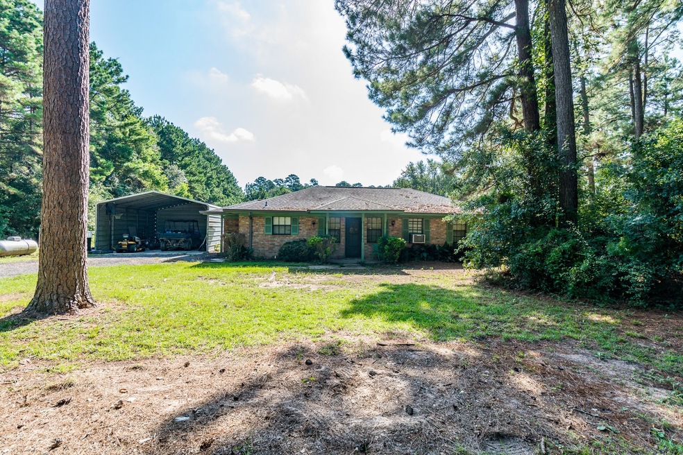 10130 Rice Rd, Cleveland, TX 77328 - photo 1