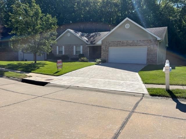 Great curb appeal with lush lawn along with 5 year
