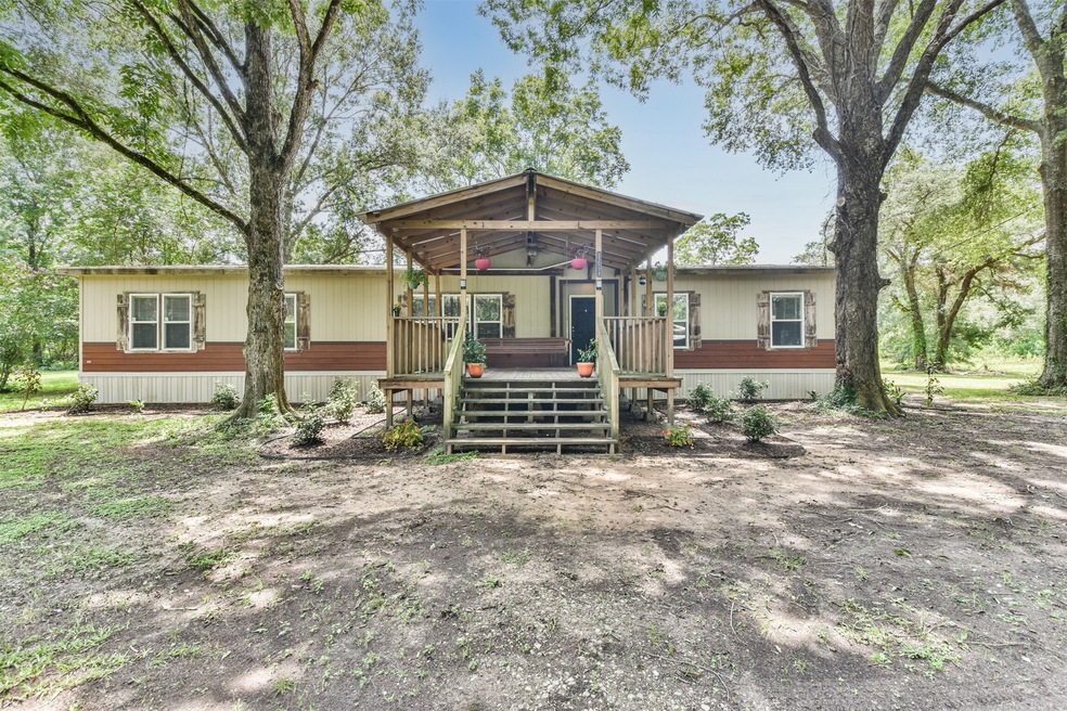 21694 Davis Rd, Splendora, TX 77372 - photo 1