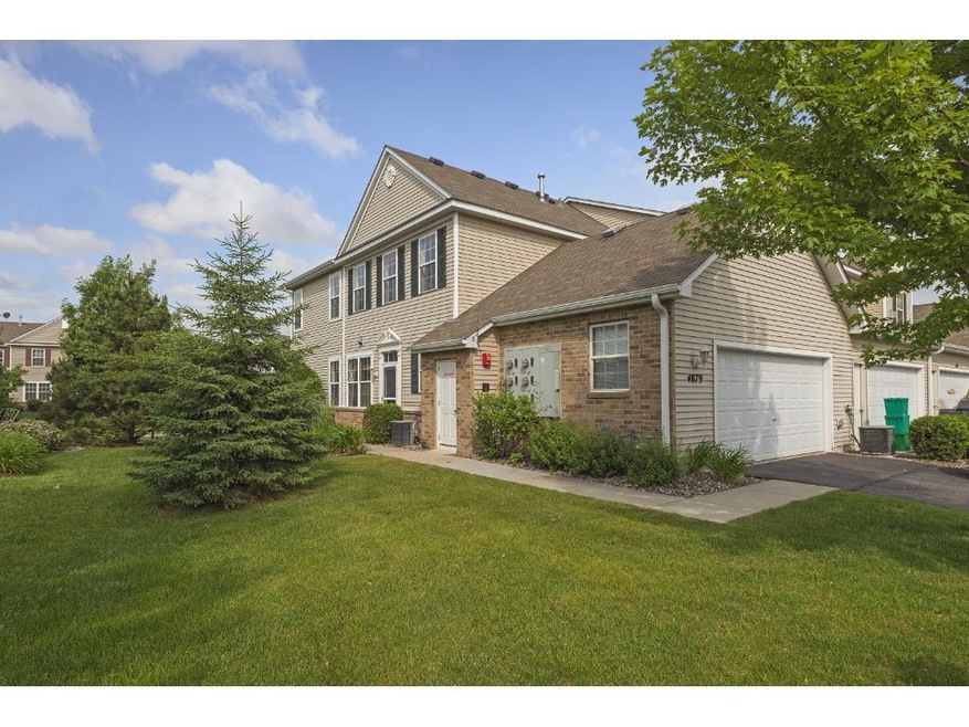 Spacious end unit townhome in this desirable neigh