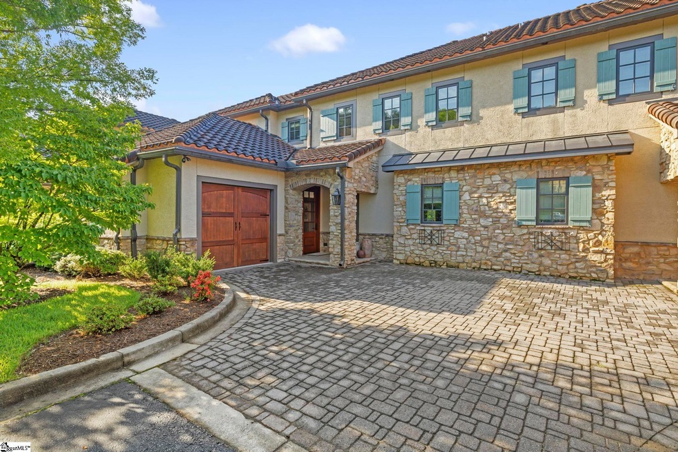Cobblestone Driveway & Tuscan Inspired Architectur