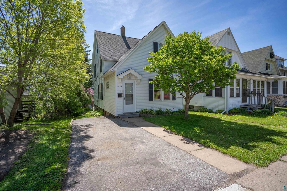 View of front of home featuring a front lawn