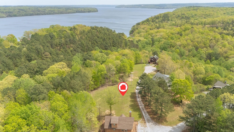 Drone / aerial view featuring a forest view and a 