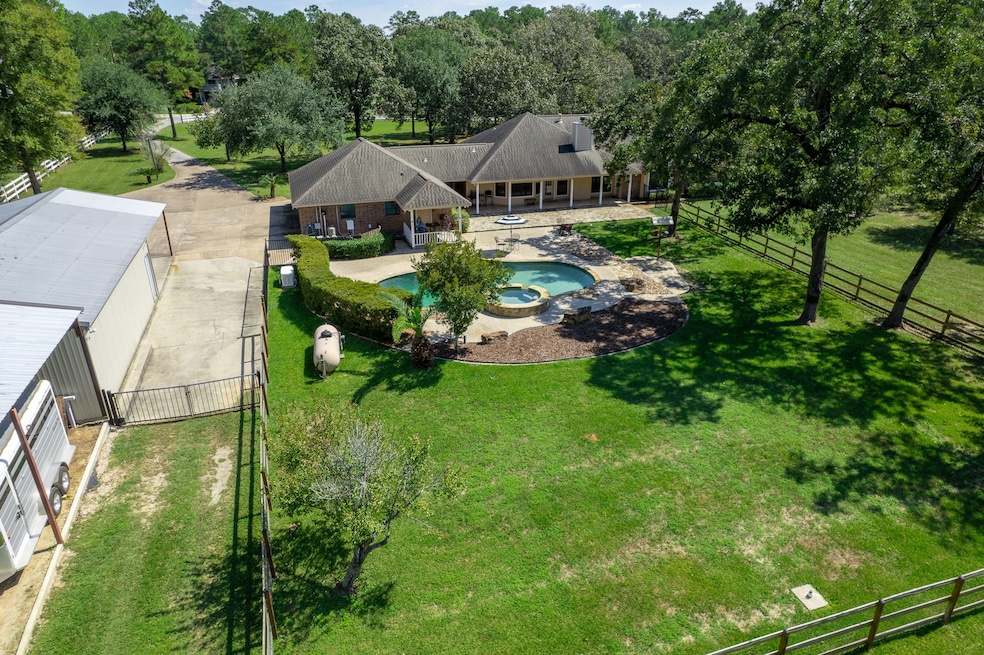 Located in Glenmont Estates on 5 fully fenced acres ready for horses.
