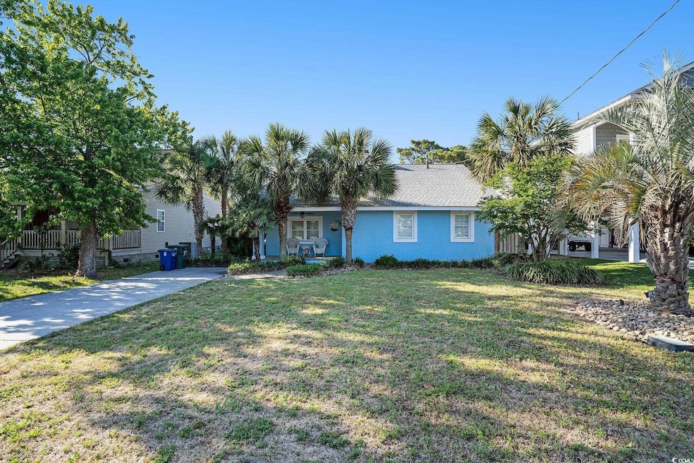 Ranch-style home with a front lawn