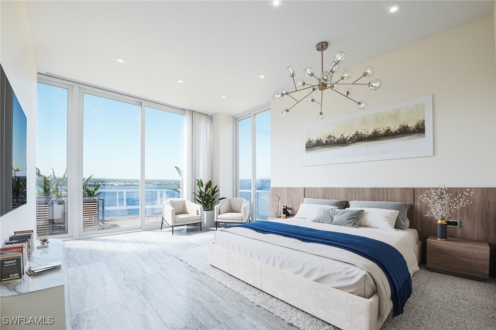 Bedroom featuring multiple windows, a notable chan