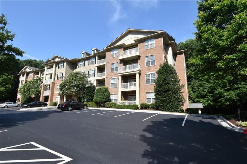 1910 Cedar Glenn Way unit 4203 is located in the 4000 building on the 2nd floor with elevator access. Schools are Brumby, East Cobb, and Wheeler High School. There is covered assigned parking, clubhouse, pool, and close proximity to Suntrust Park. Te