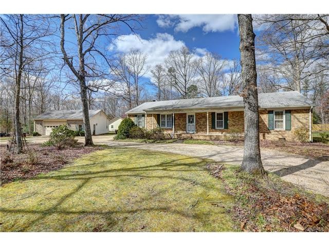 Solid brick rancher with oversized detached 2+ car