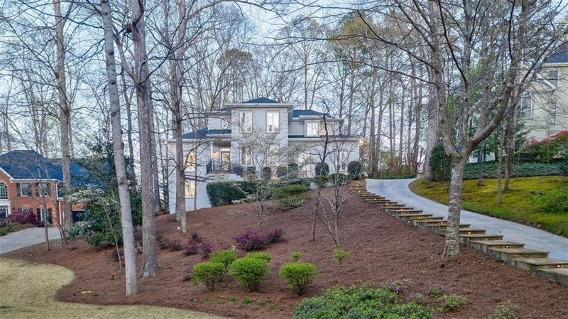Light and bright stately hillside gem includes a f