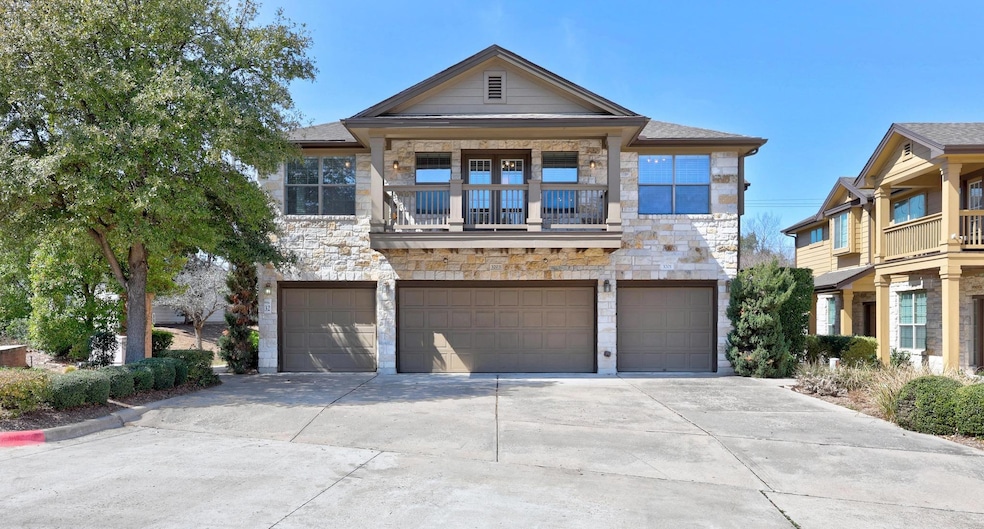 View of front of house featuring stone siding, dr