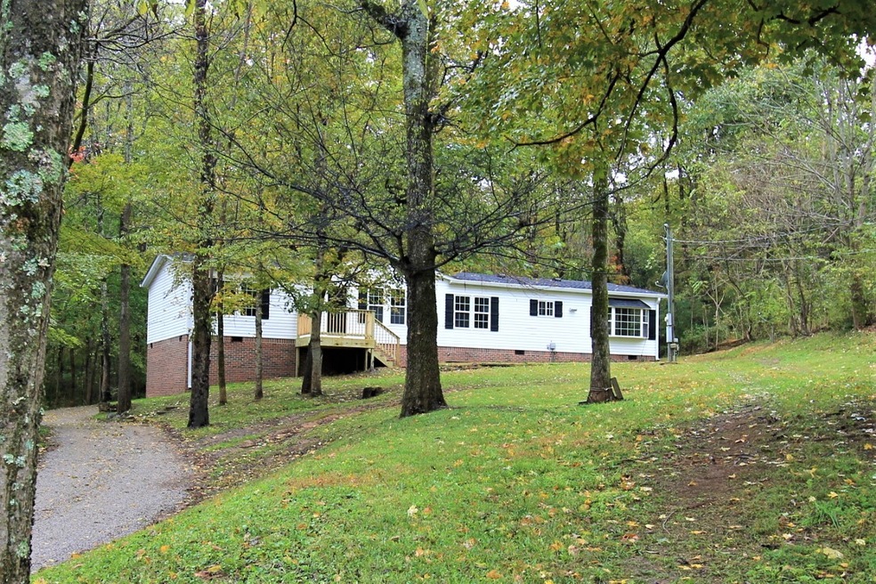 Private yet close to everything! This beautifully renovated home sits just the right amount of distance off of the road.