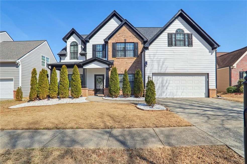 View of front of home with a garage