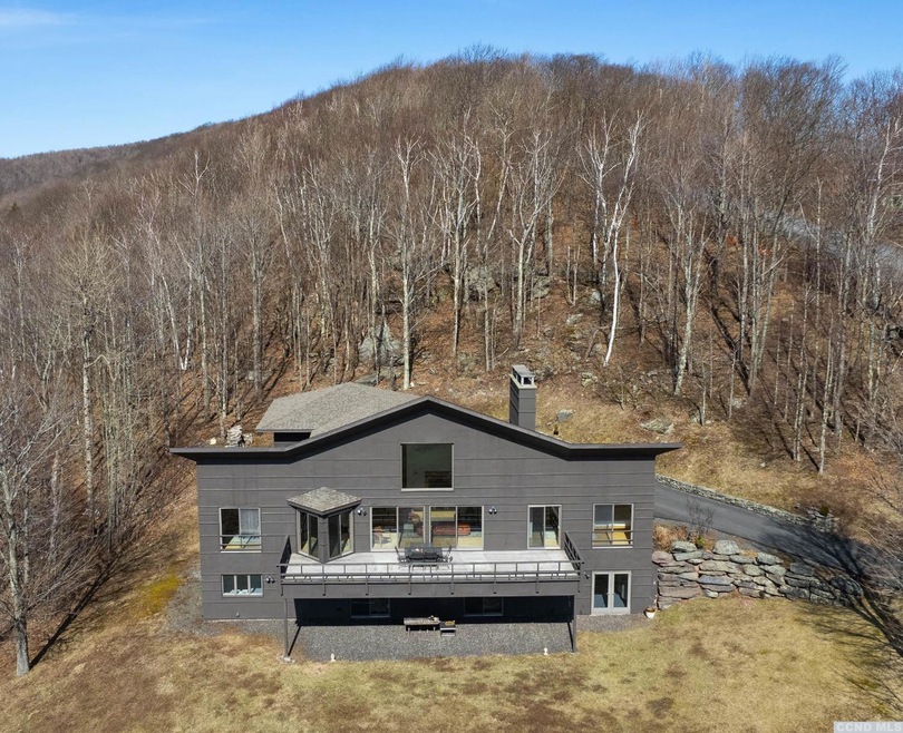 99 Buckskin Loop, your private hilltop oasis.