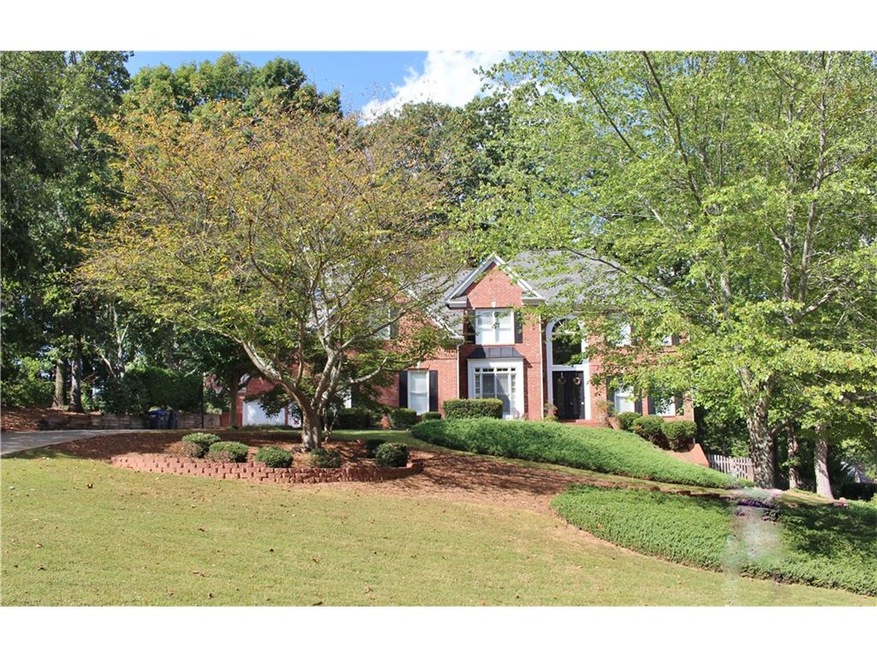 Beautiful 3-Sided Brick Home has 2-Car Side Entry 