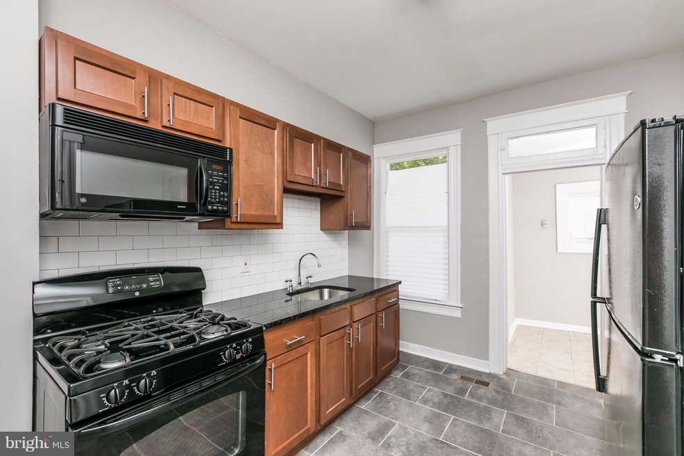 306 Lyndhurst St, Baltimore, MD 21229 - photo 1