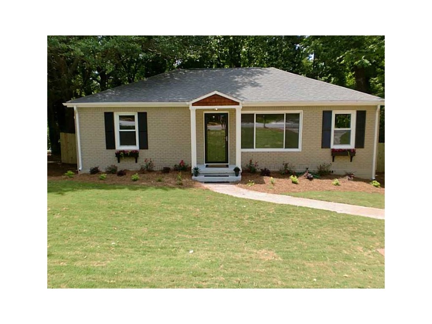 Exterior Front. Newly sodded front yard and profes