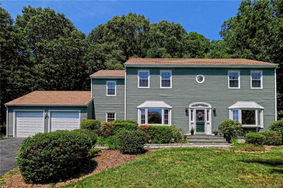 TURN-KEY CENTER HALL COLONIAL WITH ATTACHED 2 CAR 