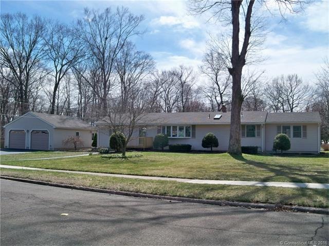 This Expanded Ranch has Wonderful Curb Appeal!