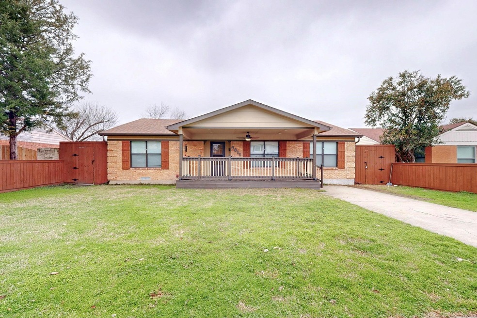 Single story home featuring covered porch and a fr