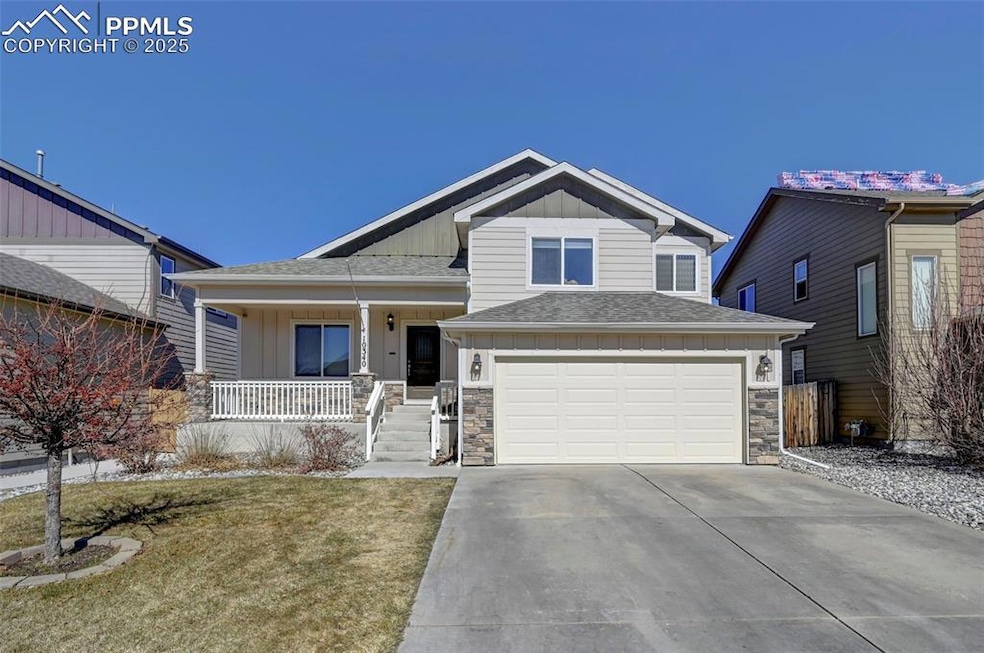 Craftsman-style house with driveway, a shingled ro