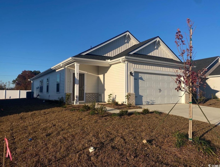 Single story home featuring a garage