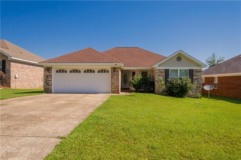 Spacious double driveway leading up to 2 car attac