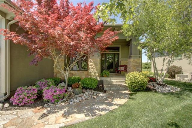 Flagstone sidewalk and porch.  Beautiful upgraded 