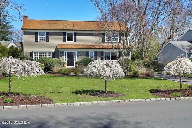Front View with Weeping Cherry Trees