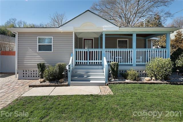Charming home with covered front porch.