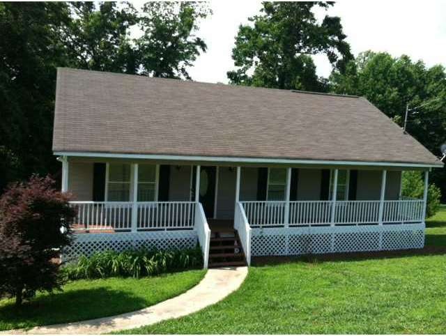 Exterior Front. Great Rocking Chair front porch. C