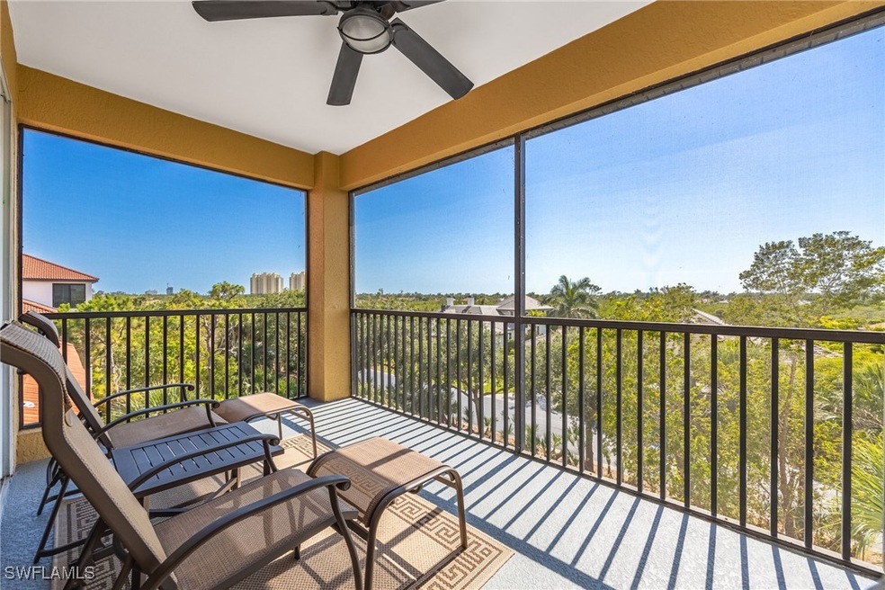 Sunroom / solarium featuring a ceiling fan and hea