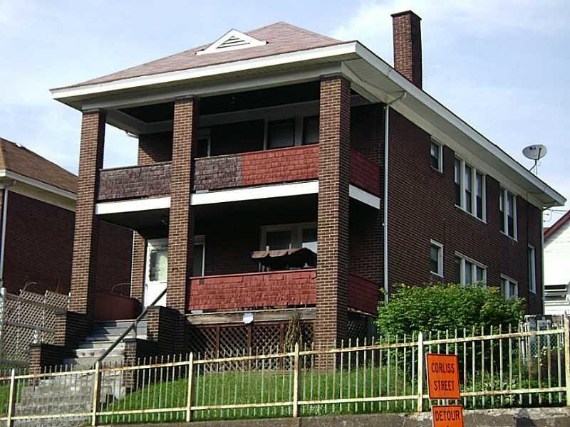 Exterior Front. SOLID BRICK DUPLEX.  LONG TIME TEN