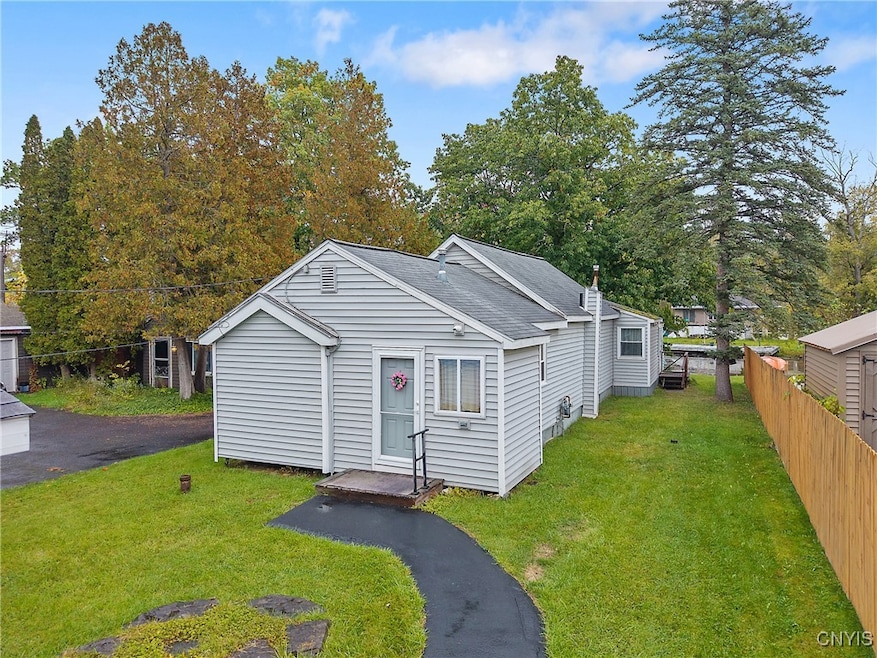Welcome to 8392 Tuttle Road! This adorable ranch has been expanded and updated over the years and is ready for its new owner's vision. A wonderful combination of peaceful suburbia and waterfront living.