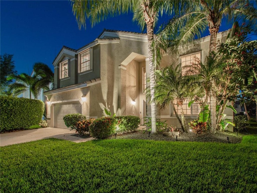 Beautiful curb appeal with landscape lighting.