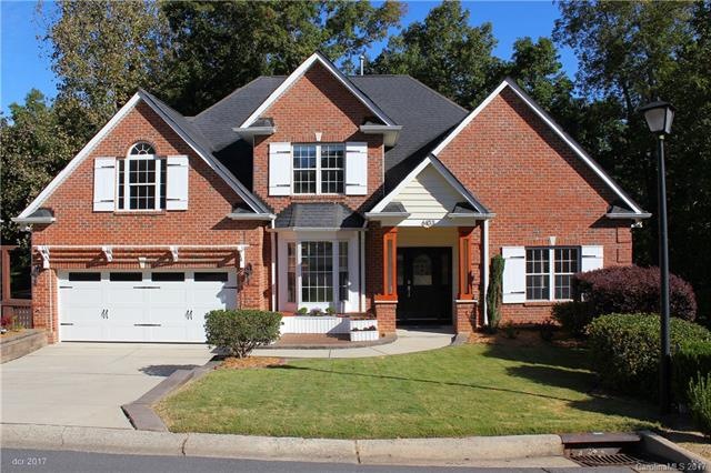 FRONT: Attractive two story home with partially fi