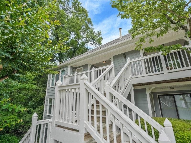 Wooden terrace featuring stairway