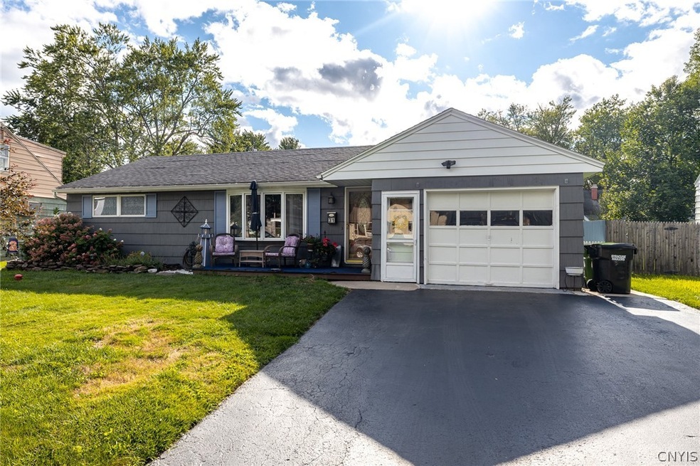 Exterior front with patio like entrance.