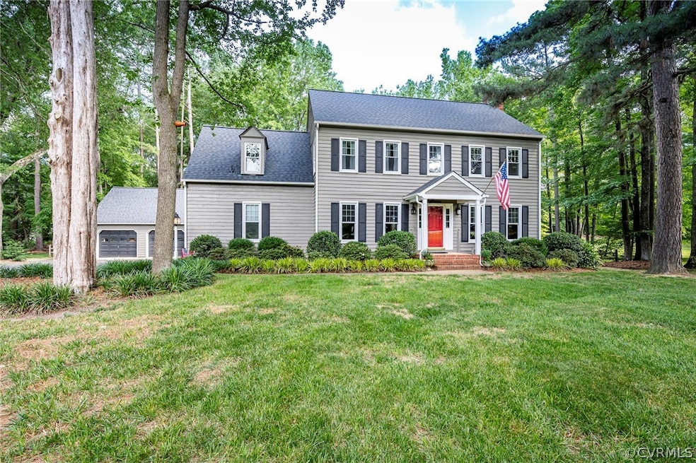 Colonial house with a front yard