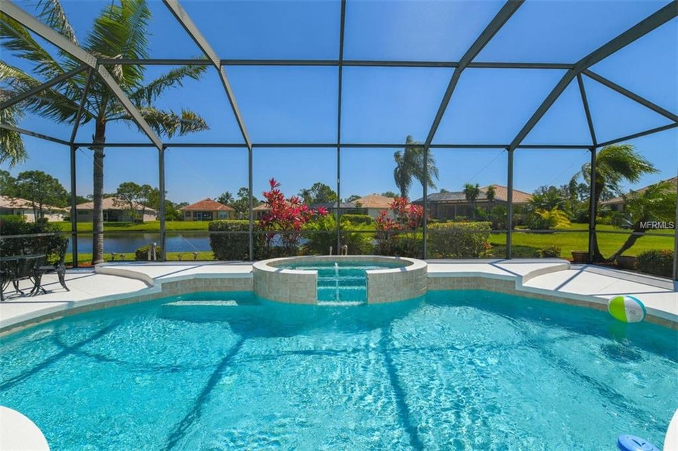 View from home showing lake view, lanai, pool, spa