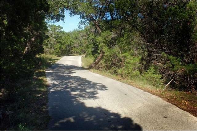 Drive thru the woods. Part of drive is paved; remainder is graded road.