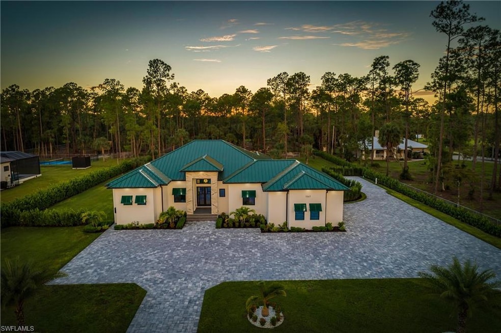 1347 23rd St SW, Naples, FL 34117 - photo 1