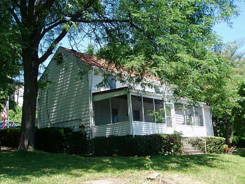 Exterior Front. Large home on corner lot with sun 