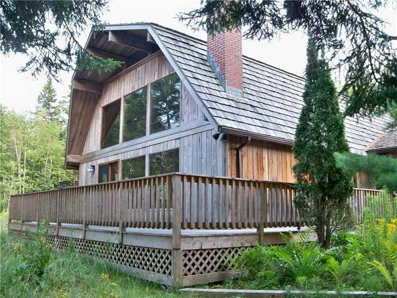 Facing the water, the deck, living...