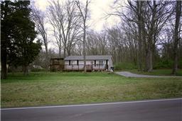 THIS HOME IS SITUATED ON A 1/2 ACRE LEVEL LOT WITH PLENTY OF MATURE TREES!