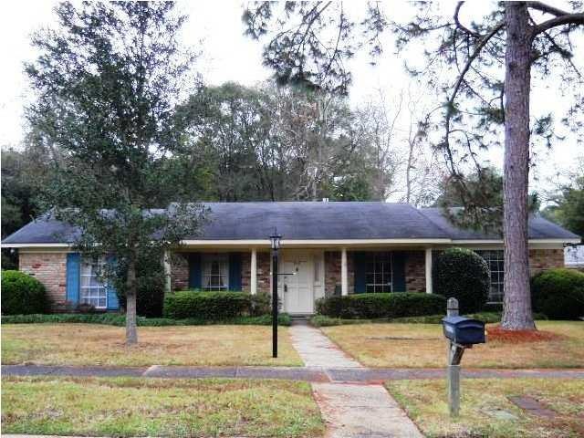Lovely classic brick ranch from the 70 s.  2300 sq