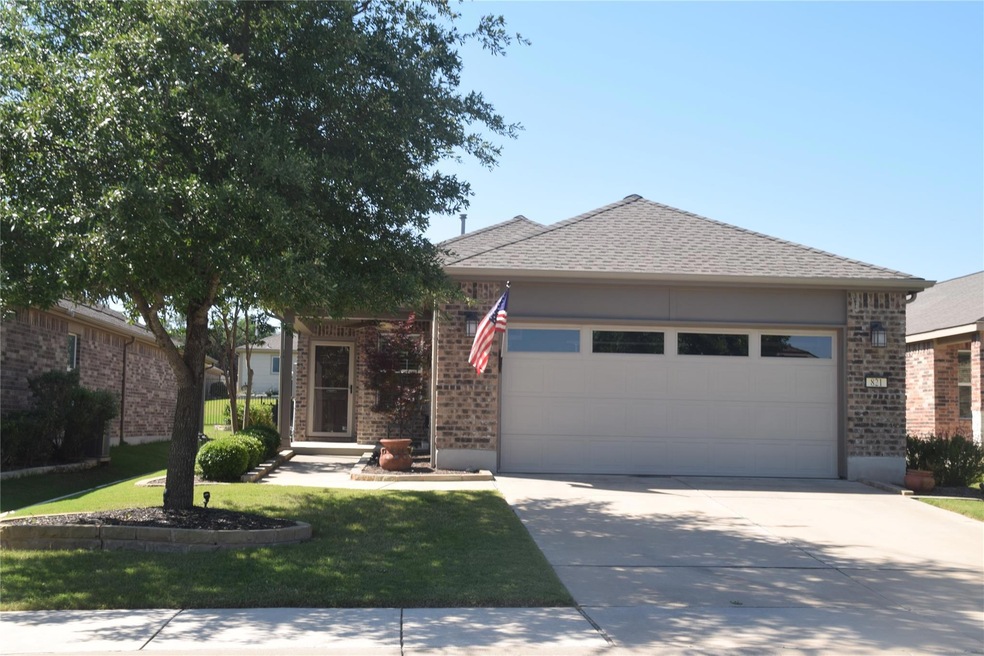 View of front of property featuring brick siding,