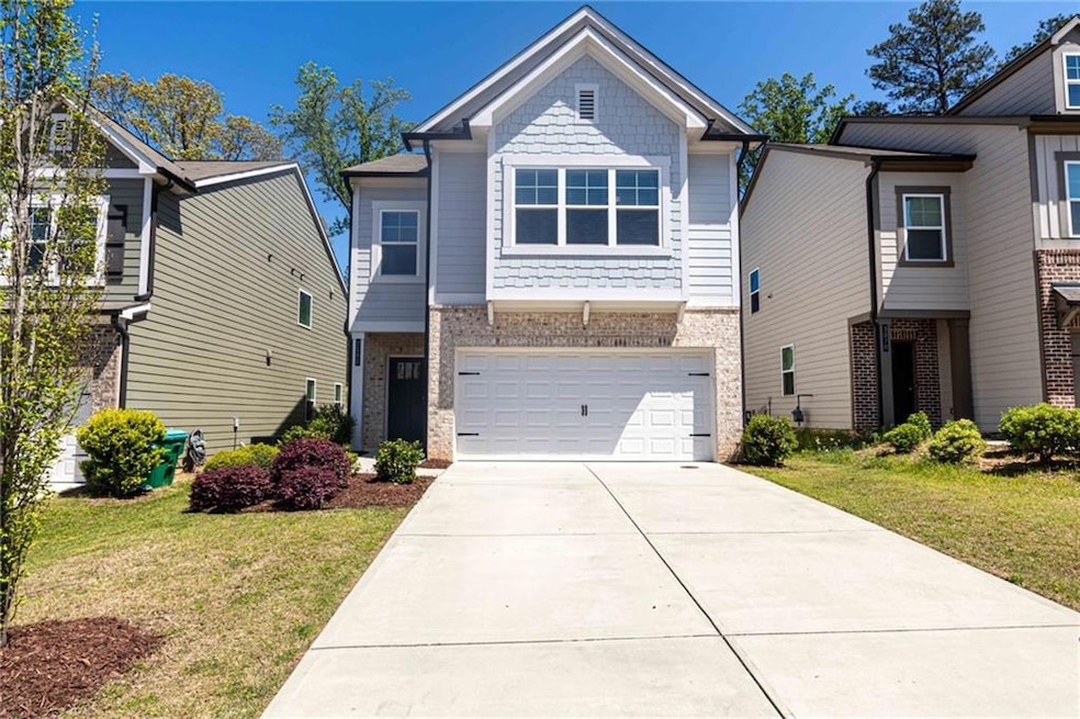 View of front of property featuring a front yard, 