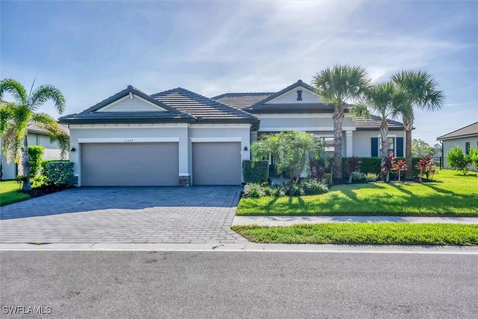 View of front of home featuring decorative drivewa