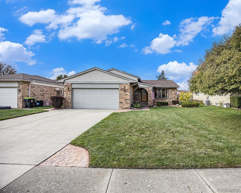 47751 Chrys Rd, Macomb, MI 48044 - photo 1