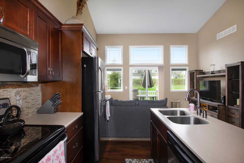 1214 Kingman Ct SW unit 48, Byron Center, MI 49315 - photo 1